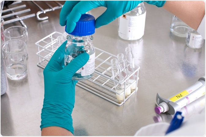 Person working in a laboratory Person working in a laboratory