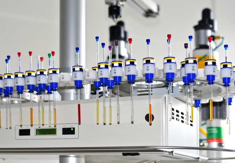 Autosampler of NMR spectrometer loaded with samples for analysis.