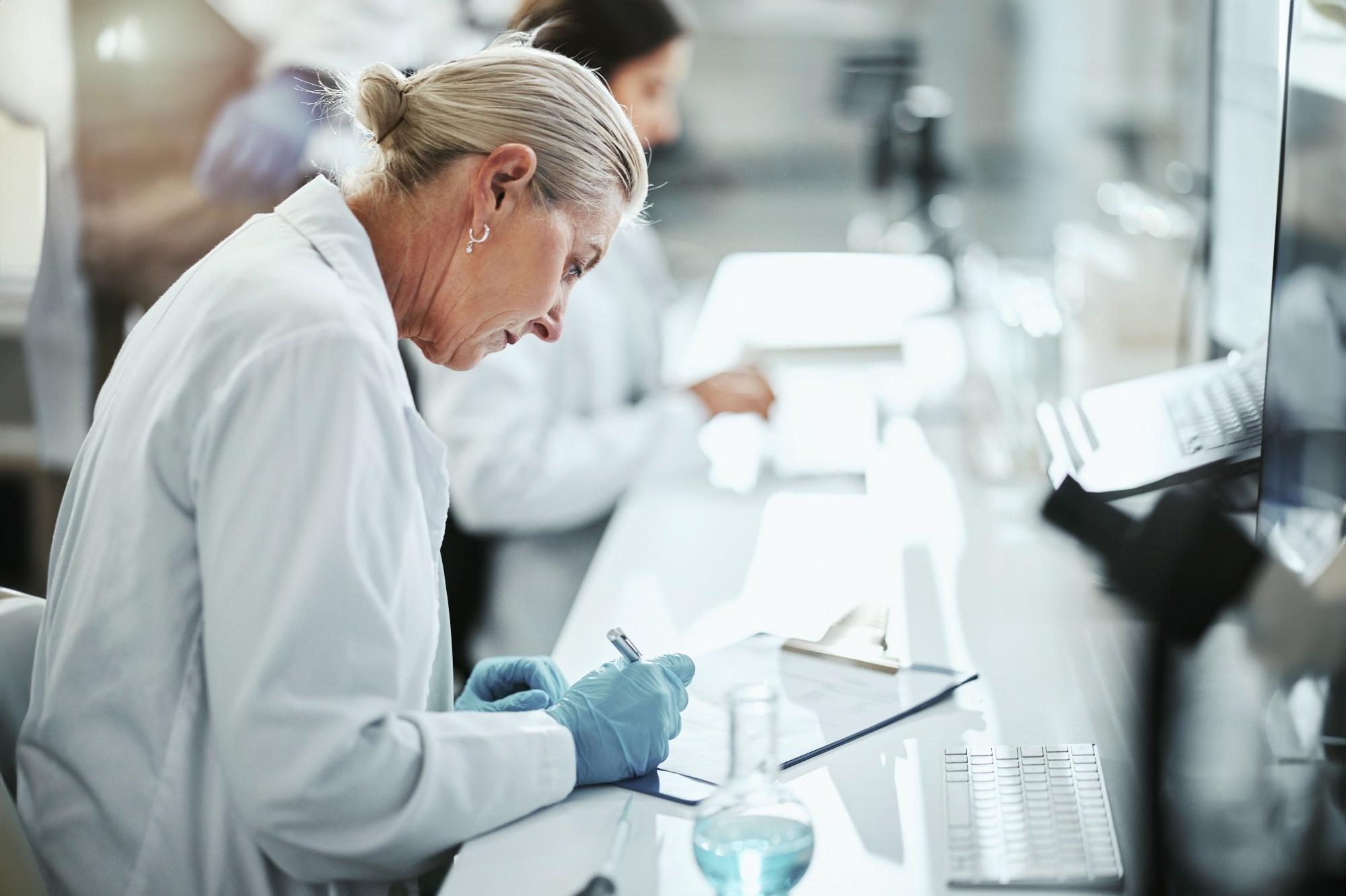 Clipboard, woman and scientist writing in laboratory
