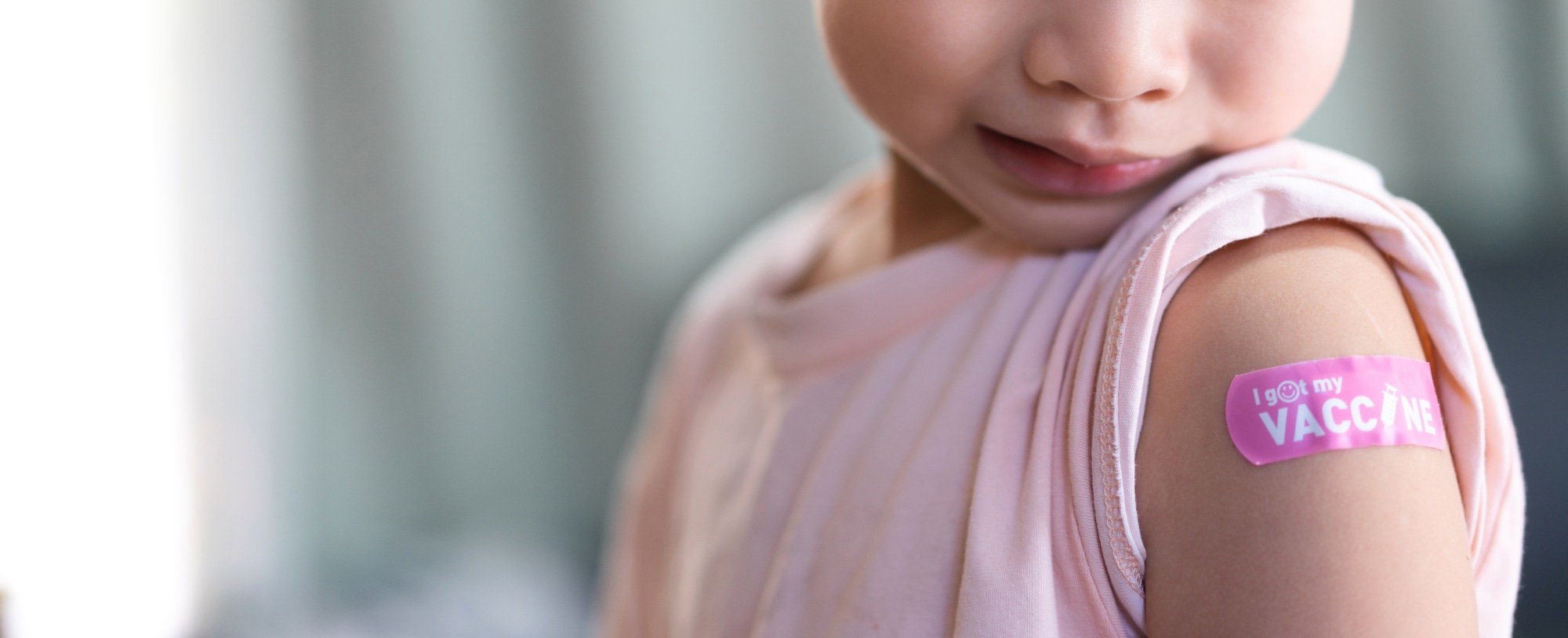 children with vaccine sticker