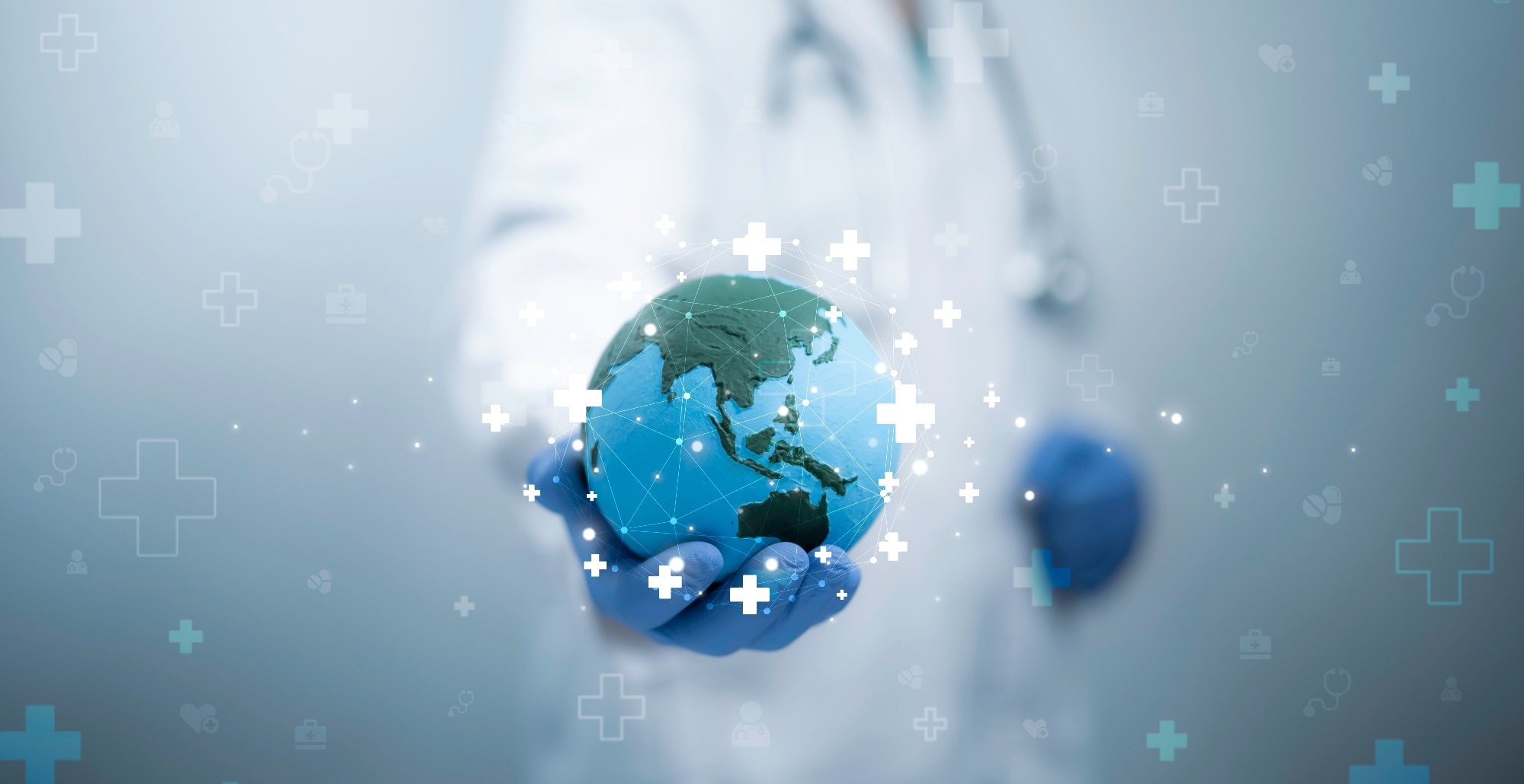 Doctor holding glowing globe in hand with a medical theme background, symbolizing global healthcare and innovation.