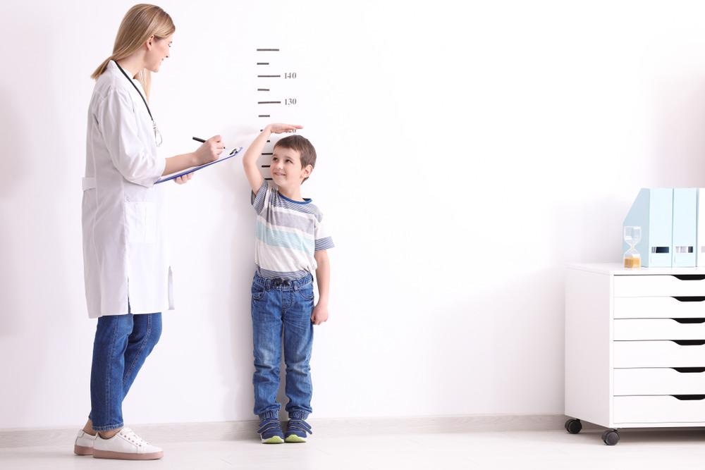 Boy Measuring Height
