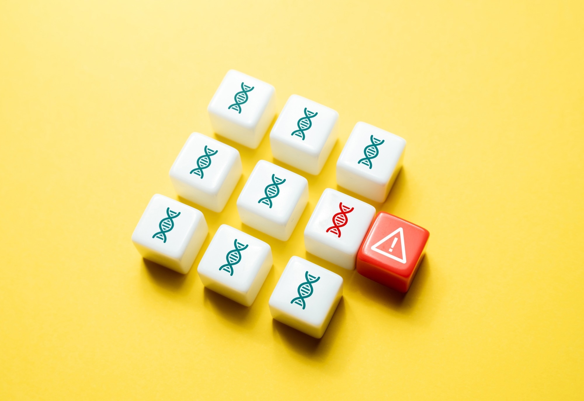 White cubes with DNA icons on a yellow background, one cube highlighted in red with a warning symbol.