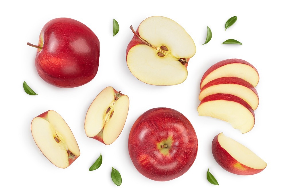 Red apple with half isolated on white background with clipping path and full depth of field. Top view. Flat lay. Set or collection