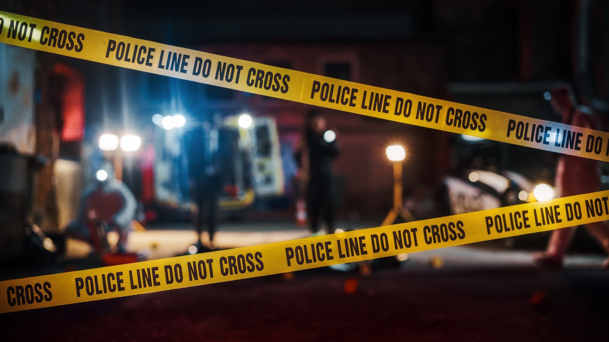 Crime Scene at Night: Crime Scene Investigation Team Working on a Murder.