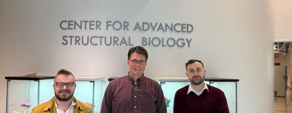 Photograph. Left to right: Conner Slone, Tom Seegar, Ph.D., and Joe Maciag, Ph.D., at the Center for Advanced Structural Biology within the University of Cincinnati